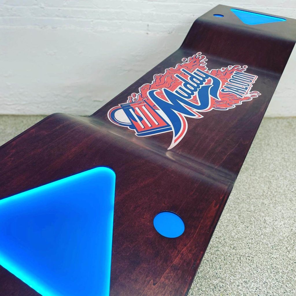 Custom Table Created by C5 Beer Pong Customized beer pong table with blue LED lights and custom graphics. 
